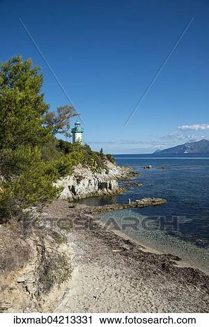 Coast with a lighthouse, Saint-Florent, Corsica, France, Europe View Large Photo Image Stock Image - Coast with a lighthouse, Saint-Florent, Corsica, France, Europe. Fotosearch
