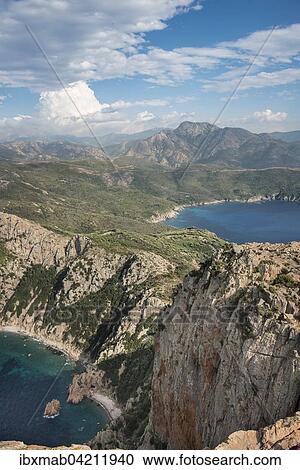 Stock Image - Coastal and mountain scenery, Gulf of Porto, Corsica, France, Europe. Fotosearch