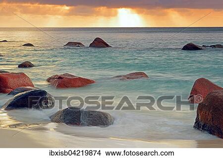 Picture - Colorful sunset at Anse Lazio, long exposure, Praslin Island, Seychelles, Africa. Fotosearch