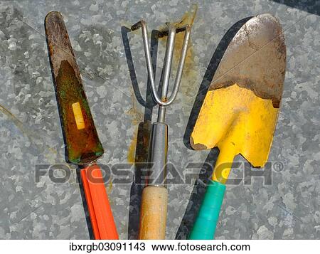 Colourful garden tools, rake, trowel View Large Photo Image Stock Image - Colourful garden tools, rake, trowel. Fotosearch