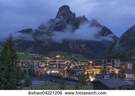 Corvara at night, Val Badia, tourist and winter sports center, Mount Sassongher behind, Dolomites, Alps, South Tyrol, Trentino-Alto Adige, Italy, Europe View Large Photo Image Stock Photograph - Corvara at night, Val Badia, tourist and winter sports center, Mount Sassongher behind, Dolomites, Alps, South Tyrol, Trentino-Alto Adige, Italy, Europe. Fotosearch
