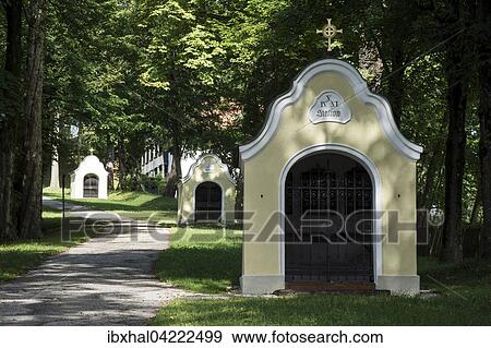 Stock Photo - Crossroad to the Calvary and Holy Cross Church or Calvary Church, Bad Tolz, Upper Bavaria, Bavaria, Germany, Europe. Fotosearch