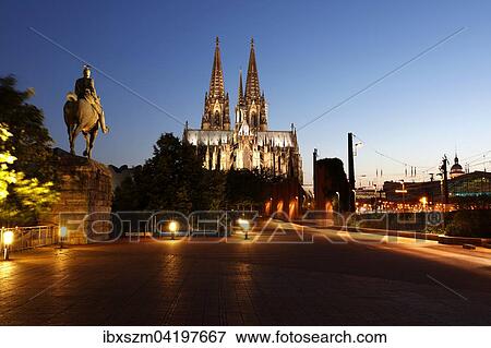 Stock Photo - Dom and equestrian statue, next to the main train station, Cologne, North Rhine-Westphalia, Germany, Europe. Fotosearch