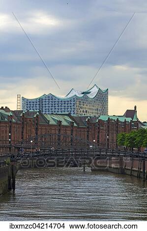 Picture - Elbphilharmonie, Elbe Philharmonic Hall behind warehouse district and Zollkanal, Hanseatic City of Hamburg, Hamburg, Germany, Europe. Fotosearch