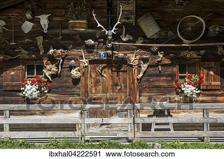 Facade of a farmhouse, decorated with souvenirs, Eng, Eng-Alm, Karwendel, Tyrol, Austria, Europe View Large Photo Image Stock Image - Facade of a farmhouse, decorated with souvenirs, Eng, Eng-Alm, Karwendel, Tyrol, Austria, Europe. Fotosearch
