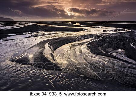 Glacial river Kuoafljot with reflecting water at sunset in Vik, Southern Region, Iceland, Europe View Large Photo Image Stock Photography - Glacial river Kuoafljot with reflecting water at sunset in Vik, Southern Region, Iceland, Europe. Fotosearch
