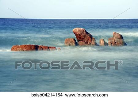 Picture - Granite rocks, Anse Takamaka beach, Praslin Island, Seychelles, Africa. Fotosearch