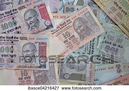 Stock Photo - Indian rupee bills with portrait of Gandhi. Fotosearch