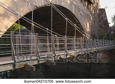 Stock Photography - Kettensteg chain-hung bridge and Fronveste above river Pegnitz, Nuremberg, Middle Franconia, Franconia, Bavaria, Germany, Europe. Fotosearch