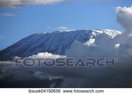 Kibo summit or Uhuru Peak of Mount Kilimanjaro, iced over, Amboseli, Kenya, Africa View Large Photo Image Stock Photograph - Kibo summit or Uhuru Peak of Mount Kilimanjaro, iced over, Amboseli, Kenya, Africa. Fotosearch