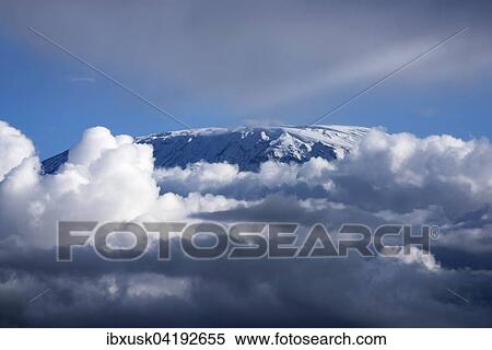Kibo summit or Uhuru Peak of Mount Kilimanjaro, iced over, Amboseli, Kenya, Africa View Large Photo Image Stock Photography - Kibo summit or Uhuru Peak of Mount Kilimanjaro, iced over, Amboseli, Kenya, Africa. Fotosearch
