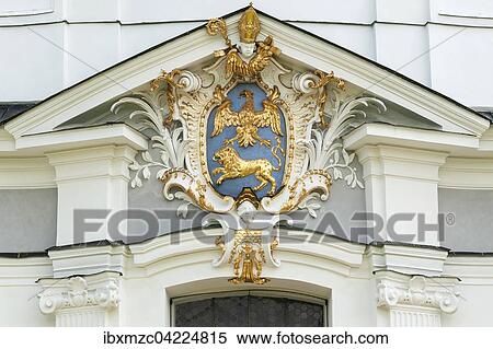 Stock Photography - Klosterwappen, monastery emblem, on the west facade of Marienmunster 1720, Diessen, Upper Bavaria, Germany, Europe. Fotosearch
