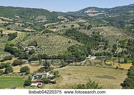 Landscape with a small village near Assisi, Province of Perugia, Umbria, Italy, Europe View Large Photo Image Stock Photography - Landscape with a small village near Assisi, Province of Perugia, Umbria, Italy, Europe. Fotosearch