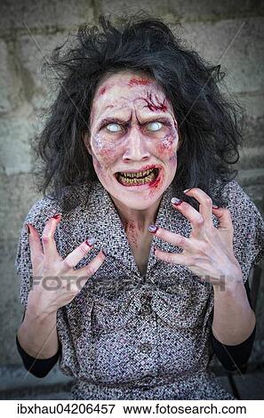 Mad and hungry zombie, film shoot, scene from zombie comedy, short film Brain Freeze View Large Photo Image Stock Photo - Mad and hungry zombie, film shoot, scene from zombie comedy, short film Brain Freeze. Fotosearch