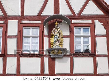 Madonna figure on a half-timbered house, Iphofen, Franconia, Lower Franconia, Franconia, Bavaria, Germany, Europe View Large Photo Image Stock Photo - Madonna figure on a half-timbered house, Iphofen, Franconia, Lower Franconia, Franconia, Bavaria, Germany, Europe. Fotosearch