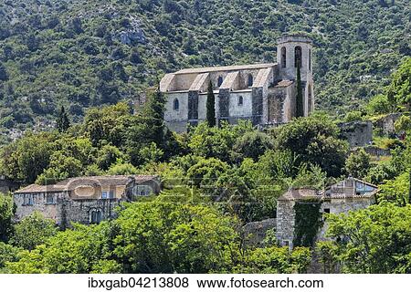 Medieval village of Oppede-le-Vieux with the Notre-Dame-d'Alidon Church, also Notre-Dame-de-Dolidon Church, Vaucluse, Provence Alpes Cote d'Azur, France, Europe View Large Photo Image Stock Photo - Medieval village of Oppede-le-Vieux with the Notre-Dame-d'Alidon Church, also Notre-Dame-de-Dolidon Church, Vaucluse, Provence Alpes Cote d'Azur, France, Europe. Fotosearch