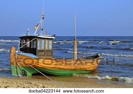 Old fishing boat on the beach, Usedom Island, Mecklenburg-Western Pomerania, Germany, Europe View Large Photo Image Picture - Old fishing boat on the beach, Usedom Island, Mecklenburg-Western Pomerania, Germany, Europe. Fotosearch