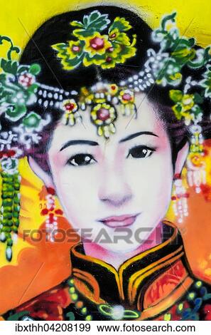 Painted image of a traditionally dressed woman on a house wall, district Kampung Bakar Batu, Malacca or Melaka, Malaysia, Asia View Large Photo Image Stock Photo - Painted image of a traditionally dressed woman on a house wall, district Kampung Bakar Batu, Malacca or Melaka, Malaysia, Asia. Fotosearch
