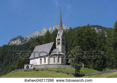 Stock Photograph - Pilgrimage church of Santa Giuliana, 1452, oldest church in Vassatal, Vigo di Fassa, Dolomites, Trentino, Province of South Tyrol, Alto Adige, Italy, Europe. Fotosearch