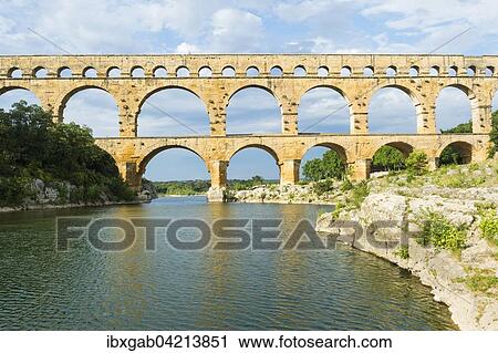 Stock Image - Pont du Gard, Roman aqueduct, Languedoc Roussillon region, Unesco World Heritage Site, France, Europe. Fotosearch