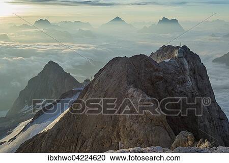 Punta Rocca with cableway station, 3265 m, view from the peak Punta Penia, at sunrise, Marmolada, Dolomites, Alps, South Tyrol, Trentino-Alto Adige, Italy, Europe View Large Photo Image Stock Image - Punta Rocca with cableway station, 3265 m, view from the peak Punta Penia, at sunrise, Marmolada, Dolomites, Alps, South Tyrol, Trentino-Alto Adige, Italy, Europe. Fotosearch