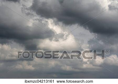 Stock Image - Rain clouds (Nimbostratus), Bavaria, Germany, Europe. Fotosearch