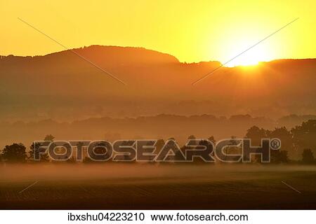 Reuss valley, sunrise in fog, autumn, Aristau, Canton of Aargau, Switzerland, Europe View Large Photo Image Stock Image - Reuss valley, sunrise in fog, autumn, Aristau, Canton of Aargau, Switzerland, Europe. Fotosearch