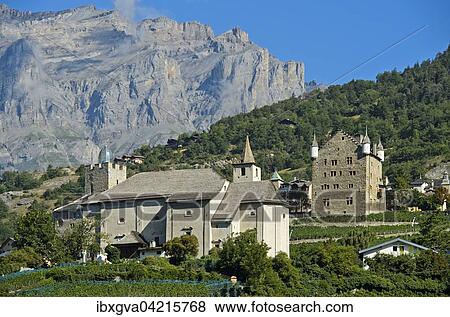 Ringacker chapel and the town hall at the foot of the Bernese Alps, Leuk Castle with Botta Dome behind, Leuk, Canton of Valais, Switzerland, Europe View Large Photo Image Stock Photo - Ringacker chapel and the town hall at the foot of the Bernese Alps, Leuk Castle with Botta Dome behind, Leuk, Canton of Valais, Switzerland, Europe. Fotosearch