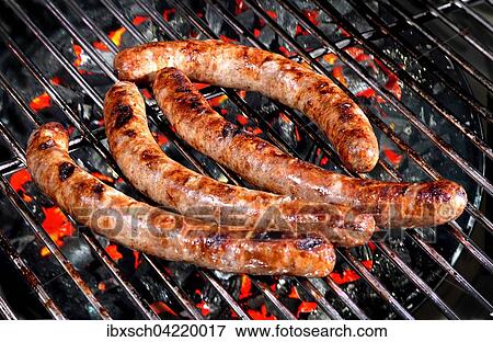 Sausages on a barbecue, red hot coals View Large Photo Image Stock Photo - Sausages on a barbecue, red hot coals. Fotosearch