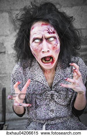 Screaming Hungry Zombie, film shoot, scene from a zombie comedy, short film Brain Freeze View Large Photo Image Stock Photography - Screaming Hungry Zombie, film shoot, scene from a zombie comedy, short film Brain Freeze. Fotosearch