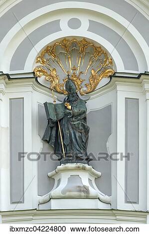 Sculpture of St. Augustine on the west facade of the Marienmunsters 1720, Diessen, Upper Bavaria, Germany, Europe View Large Photo Image Stock Image - Sculpture of St. Augustine on the west facade of the Marienmunsters 1720, Diessen, Upper Bavaria, Germany, Europe. Fotosearch