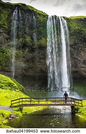 Seljalandsfoss Waterfall, with bridge, Iceland, Europe View Large Photo Image Stock Image - Seljalandsfoss Waterfall, with bridge, Iceland, Europe. Fotosearch