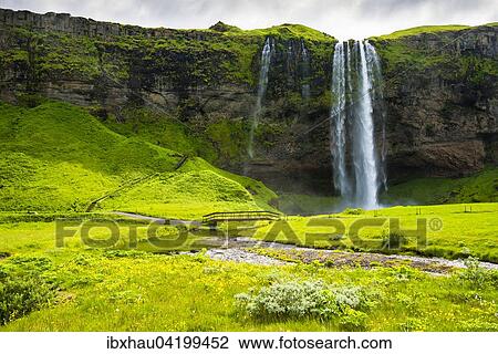 Seljalandsfoss Waterfall with green meadows, Iceland, Europe View Large Photo Image Stock Image - Seljalandsfoss Waterfall with green meadows, Iceland, Europe. Fotosearch