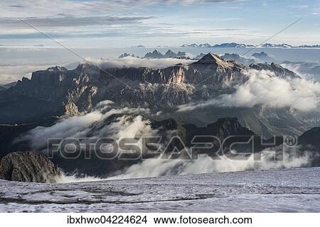 Sella group with Piz Boe, 3152 m, view from the peak Punta Penia, clouds, Marmolada, Dolomites, Alps, South Tyrol, Trentino-Alto Adige, Italy, Europe View Large Photo Image Picture - Sella group with Piz Boe, 3152 m, view from the peak Punta Penia, clouds, Marmolada, Dolomites, Alps, South Tyrol, Trentino-Alto Adige, Italy, Europe. Fotosearch