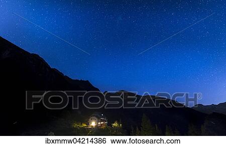 Stock Photograph - Starry sky above Gollinghutte at night, Rohrmoos-Untertal, Schladming Tauern, Alps, Styria, Austria, Europe. Fotosearch