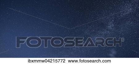 Stock Image - Starry sky with milky way at night in the Schladming Tauern, Alps, Styria, Austria, Europe. Fotosearch