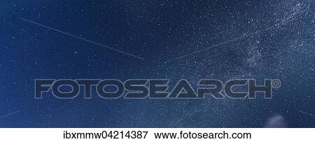 Stock Photo - Starry sky with milky way at night in the Schladming Tauern, Alps, Styria, Austria, Europe. Fotosearch