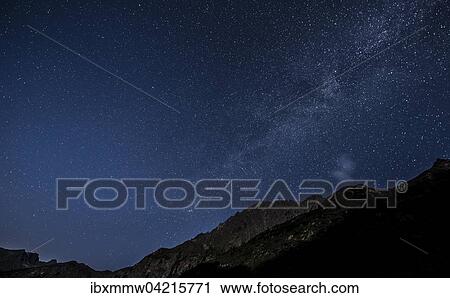 Stock Image - Starry sky with milky way at night, Rohrmoos-Untertal, Schladming Tauern, Alps, Styria, Austria, Europe. Fotosearch