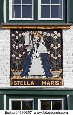 Stella Maris, Mary, Star of the Sea, sgraffito on a villa from 1926, historic uptown de Concessie, seaside resort De Haan, West Flanders, Belgium, Europe View Large Photo Image Stock Photo - Stella Maris, Mary, Star of the Sea, sgraffito on a villa from 1926, historic uptown de Concessie, seaside resort De Haan, West Flanders, Belgium, Europe. Fotosearch