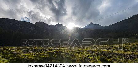 Sun shining over the mountain peak, Rohrmoos-Untertal, Styria, Austria, Europe View Large Photo Image Picture - Sun shining over the mountain peak, Rohrmoos-Untertal, Styria, Austria, Europe. Fotosearch