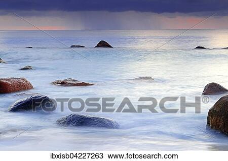 Sunset at Anse Lazio, rain at the horizon, Praslin Island, Seychelles, Africa View Large Photo Image Stock Image - Sunset at Anse Lazio, rain at the horizon, Praslin Island, Seychelles, Africa. Fotosearch