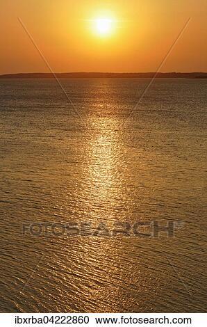 Sunset at the Achterwasser lagoon, Usedom Island, Mecklenburg-Western Pomerania, Germany, Europe View Large Photo Image Stock Image - Sunset at the Achterwasser lagoon, Usedom Island, Mecklenburg-Western Pomerania, Germany, Europe. Fotosearch