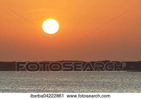Sunset at the Achterwasser lagoon, Usedom Island, Mecklenburg-Western Pomerania, Germany, Europe View Large Photo Image Stock Image - Sunset at the Achterwasser lagoon, Usedom Island, Mecklenburg-Western Pomerania, Germany, Europe. Fotosearch