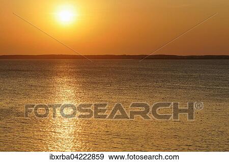 Sunset at the Achterwasser lagoon, Usedom Island, Mecklenburg-Western Pomerania, Germany, Europe View Large Photo Image Stock Photo - Sunset at the Achterwasser lagoon, Usedom Island, Mecklenburg-Western Pomerania, Germany, Europe. Fotosearch