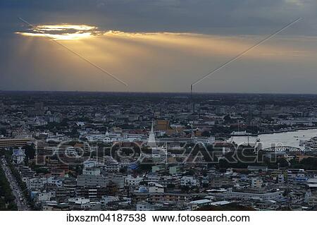 Sunset with dark clouds over the city center, Bangkok, Thailand, Asia View Large Photo Image Stock Photo - Sunset with dark clouds over the city center, Bangkok, Thailand, Asia. Fotosearch
