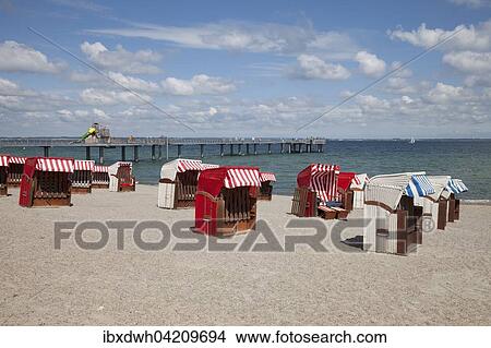 Timmendorfer beach with beach chairs and pier, Niendorf, Bay of Lubeck, Schleswig-Holstein, Germany, Europe View Large Photo Image Picture - Timmendorfer beach with beach chairs and pier, Niendorf, Bay of Lubeck, Schleswig-Holstein, Germany, Europe. Fotosearch