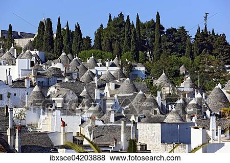 Trulli, houses with round stone roofs, Alberobello, Apulia, Italy, Europe View Large Photo Image Stock Photo - Trulli, houses with round stone roofs, Alberobello, Apulia, Italy, Europe. Fotosearch