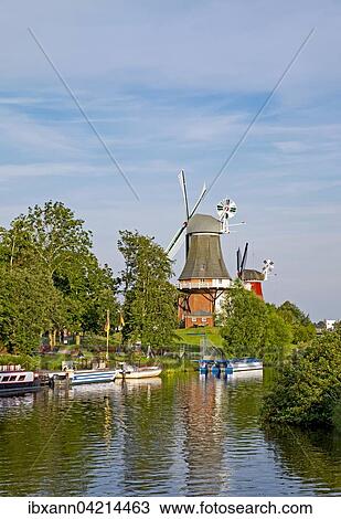 Twin windmills, stelling molen, Greetsiel, Krummhorn, East Frisia, Lower Saxony, Germany, Europe View Large Photo Image Stock Image - Twin windmills, stelling molen, Greetsiel, Krummhorn, East Frisia, Lower Saxony, Germany, Europe. Fotosearch