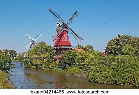 Twin windmills, stelling molen, Greetsiel, Krummhorn, East Frisia, Lower Saxony, Germany, Europe View Large Photo Image Stock Photography - Twin windmills, stelling molen, Greetsiel, Krummhorn, East Frisia, Lower Saxony, Germany, Europe. Fotosearch