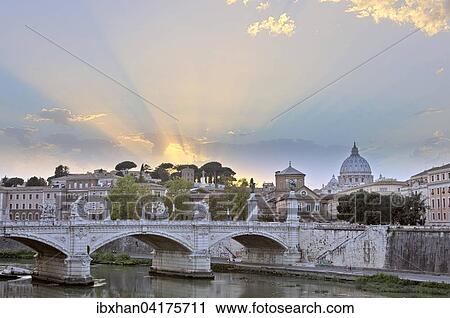 View from the Ponte Sant'Angelo bridge to Vittorio Emanuelle II bridge and to St. Peter's Basilica at sunset, Rome, Lazio, Italy, Europe View Large Photo Image Stock Image - View from the Ponte Sant'Angelo bridge to Vittorio Emanuelle II bridge and to St. Peter's Basilica at sunset, Rome, Lazio, Italy, Europe. Fotosearch